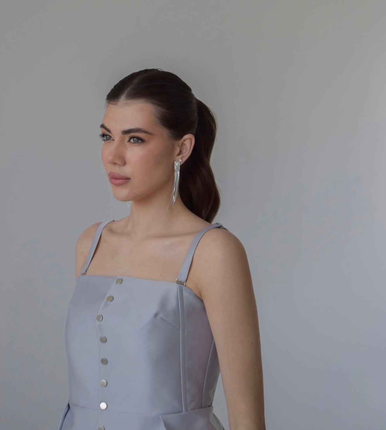 A CORSET AND TROUSERS SUIT