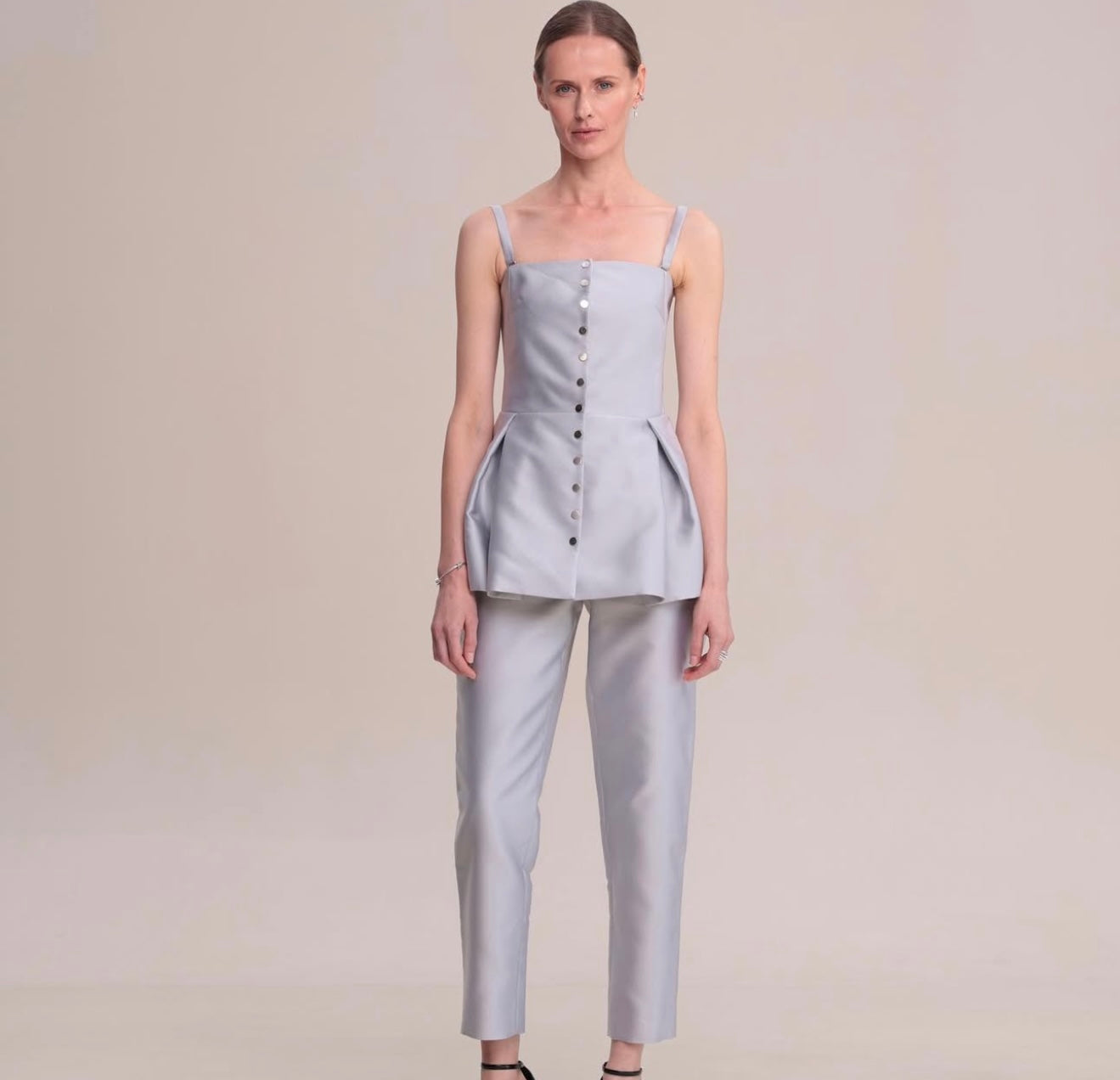A CORSET AND TROUSERS SUIT