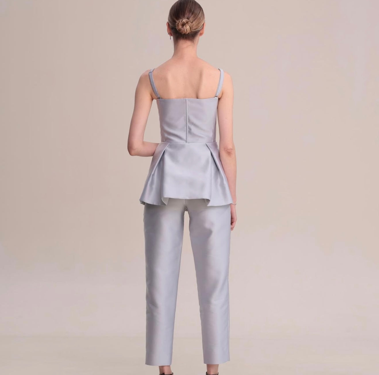 A CORSET AND TROUSERS SUIT